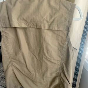 Eddie Bauer light weight vest. Lots of pockets. Water resistant, never worn